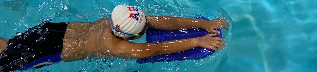 Parent and toddler swim lessons with instructors.